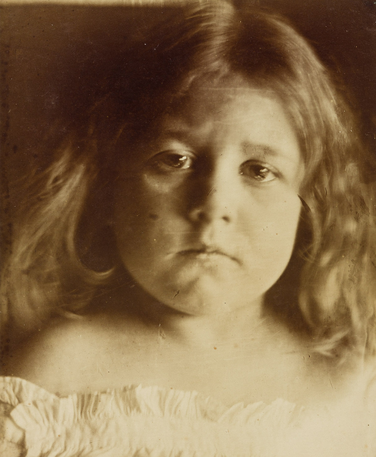 JULIA MARGARET CAMERON (1815-1879) Baby Blossom (Portrait of Alice Keown).